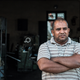 Ibrahim outside his car repair shop